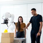 engineers developing robotic arm