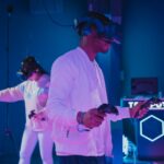 man playing a video game while wearing a vr headset