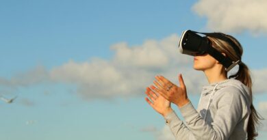 woman using vr goggles outdoors